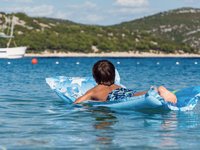 children-on-inflatable-sunbed.jpg