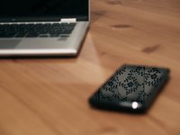 laptop-and-smartphone-on-wooden-table.jpg
