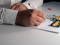doctor-writes-a-prescription.jpg